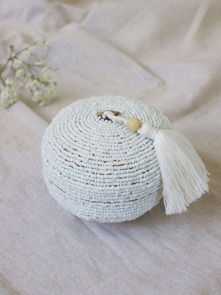 mini round hand-beaded white bamboo basket with cream tassel