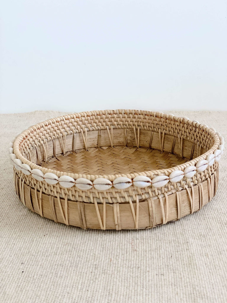medium handmade bamboo and rattan tray basket with cowrie shell detail