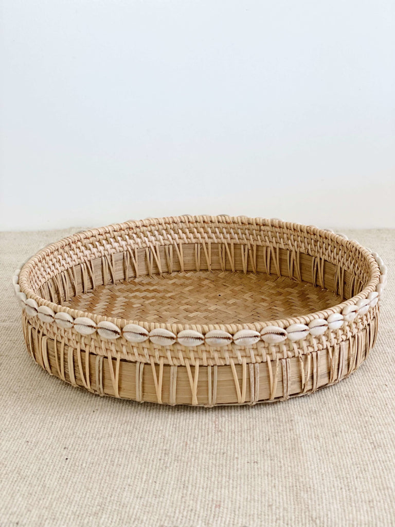 large handmade bamboo and rattan tray basket with cowrie shell detail