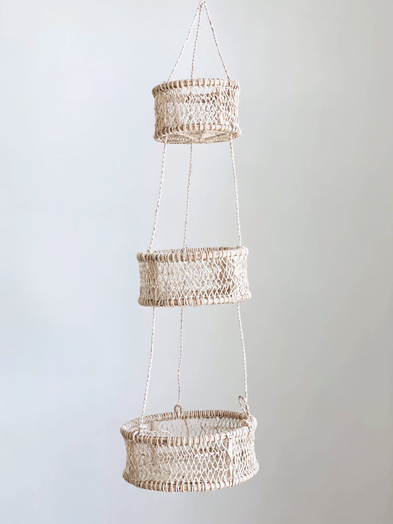 three tier handwoven hanging bohemian full moon baskets product photo on white wall