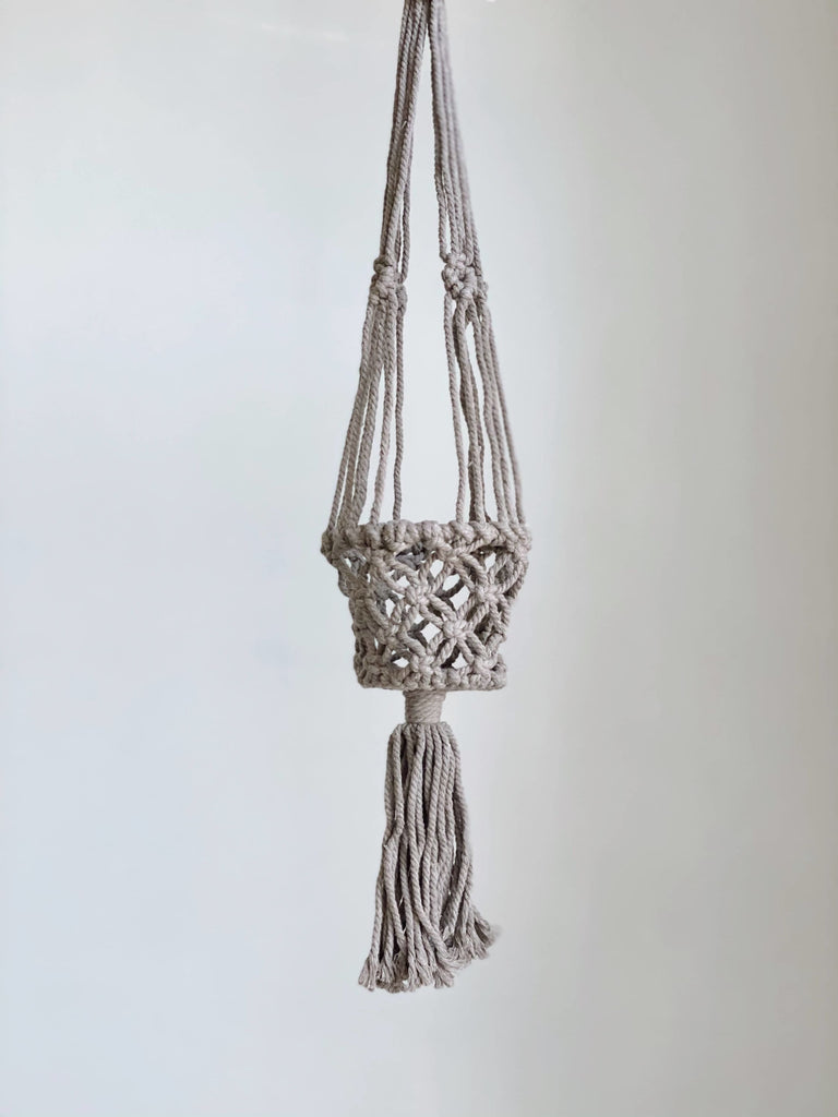 product photo of mini handmade brown macrame plant hanger basket