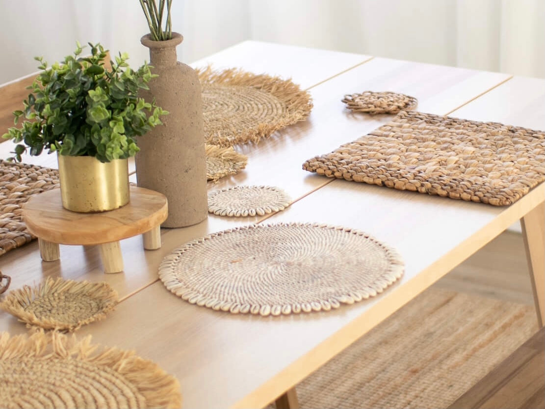 photo of beautiful rustic modern boho dining table with handmade tabletop pieces