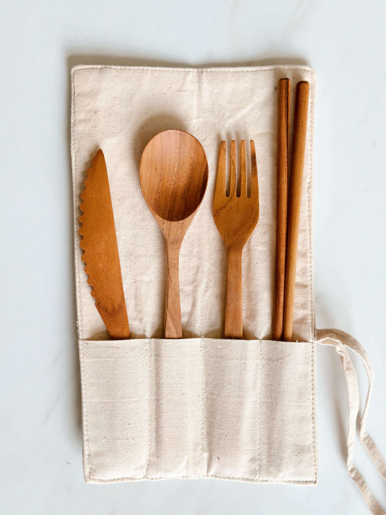 photo of teak wood re-usable cutlery set inside cotton pouch