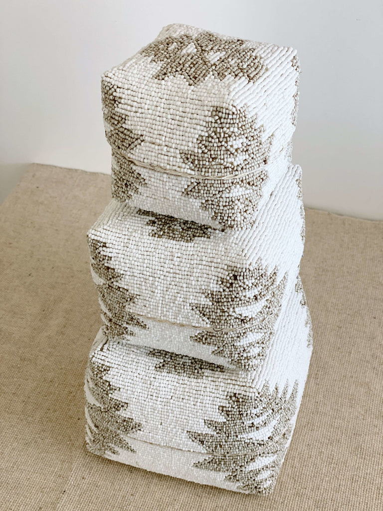 stack of 3 beaded bamboo baskets in white and tan tribal print color
