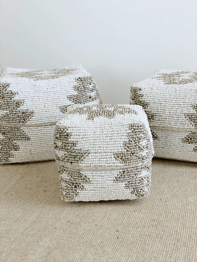 set of beautiful beaded bamboo nesting baskets with unique tribal print in white and tan color