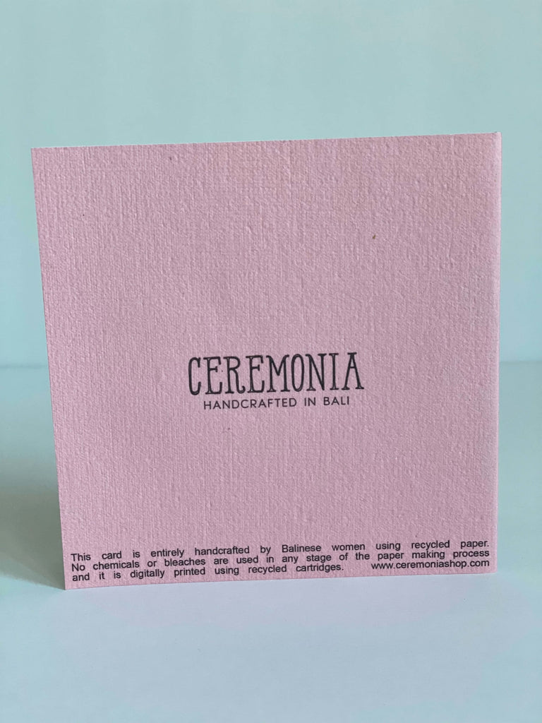 the back of the pink handcrafted umbrella greeting card using recycled cartridges with the CEREMONIA logo