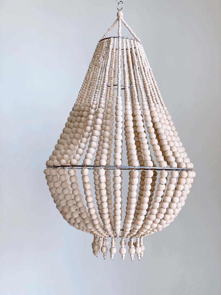 product photo of medium handcarved natural wooden bead chandelier hanging with white background