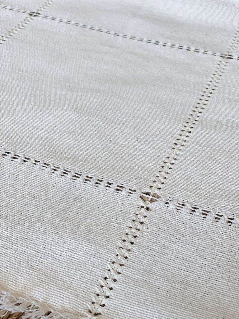 close up detail photo of handmade linen white napkin