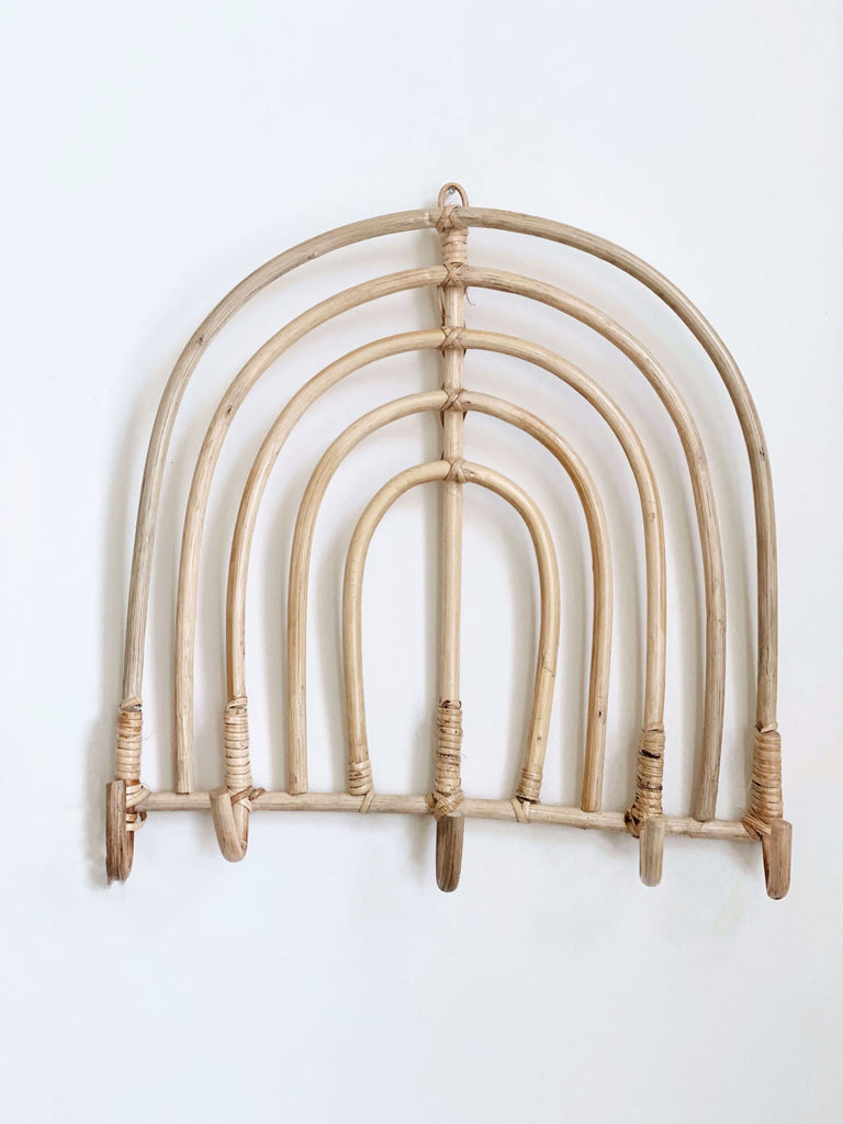 product photo of rattan rainbow rack with 5 hooks on white wall