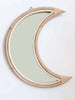 product photo of medium bohemian handmade rattan crescent moon mirror on white wall