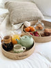 delicious aesthetic breakfast in bed using bohemian nesting serving trays in a light filled room