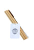 stock photo of eco-friendly organic re-usable bamboo straw set and coconut husk cleaner with ceremonia tag