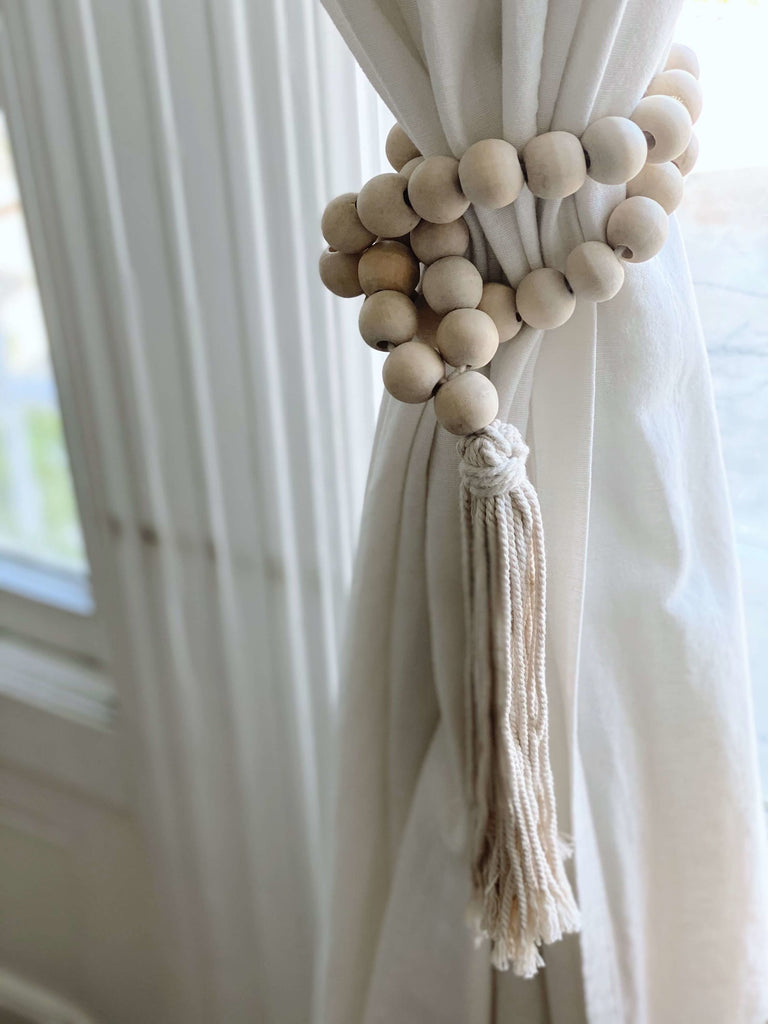 boho handcarved natural wooden bead cream tassel used as white linen curtain tieback
